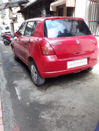 Red Maruti Suzuki Swift VXI