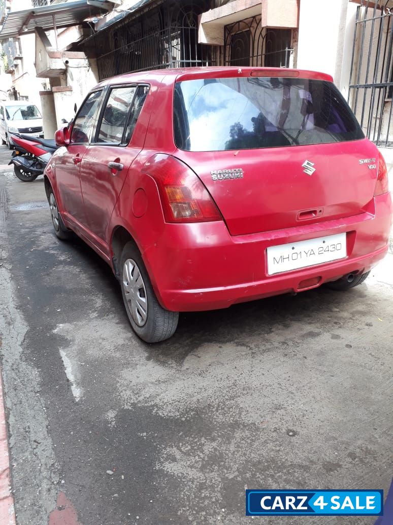 Red Maruti Suzuki Swift VXI