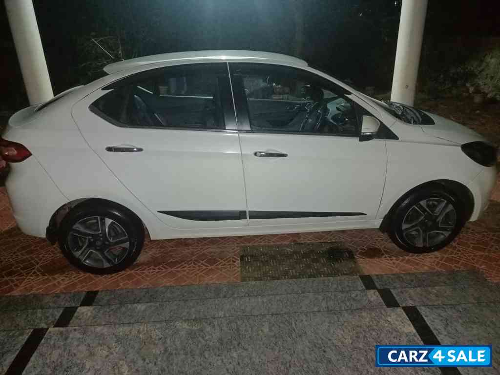 White Tata Tigor TATA TIGOR XZO PETROL White Tata Tigor TATA TIGOR XZO PETROL
