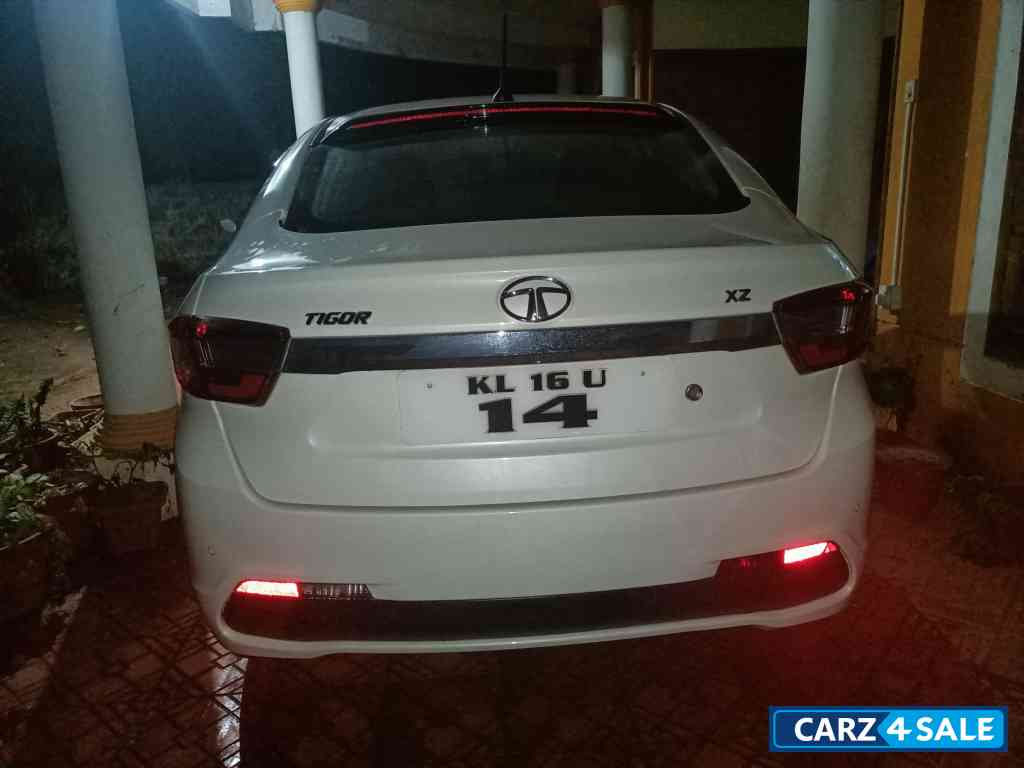 White Tata Tigor TATA TIGOR XZO PETROL White Tata Tigor TATA TIGOR XZO PETROL