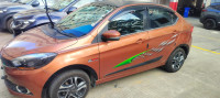 Copper Brown Tata Tigor XZ top end