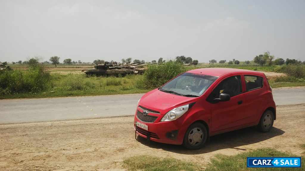 Super Red Chevrolet Beat ls petrol Super Red Chevrolet Beat ls petrol