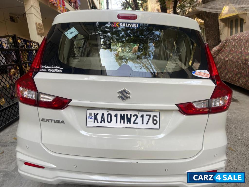 Pearl Arctic White Maruti Suzuki Ertiga VXICNG Pearl Arctic White Maruti Suzuki Ertiga VXICNG