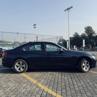 Blue BMW 3-Series 320 D