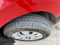 Red Maruti Suzuki Baleno Delta