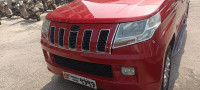 Red And Black Mahindra TUV300 T8 automatic disel