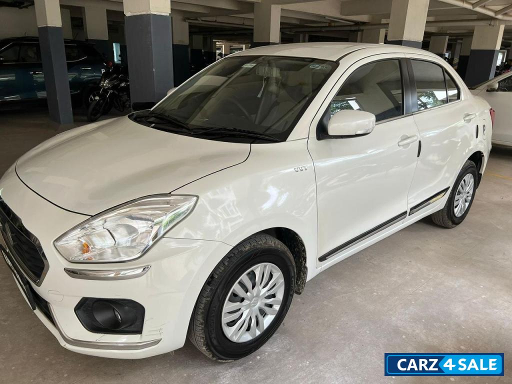 Pearl White Maruti Suzuki Dzire VXI