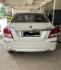 Pearl White Maruti Suzuki Dzire VXI