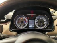 Pearl White Maruti Suzuki Dzire VXI