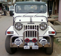 White Mahindra Jeep