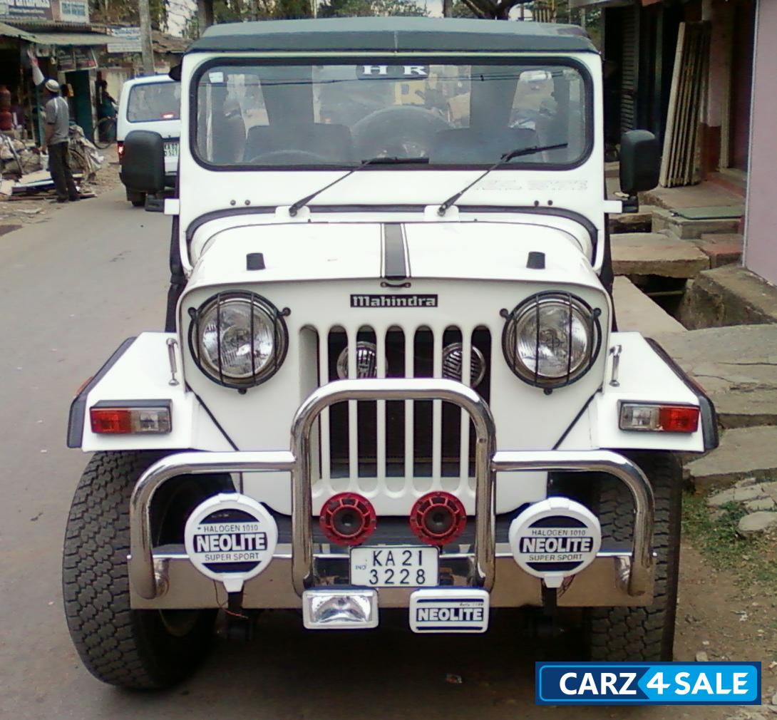 White Mahindra Jeep