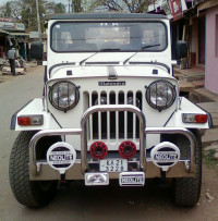 White Mahindra Jeep