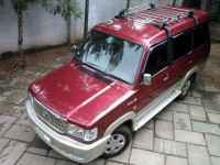 Metallic Maroon Toyota Qualis