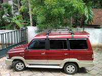 Metallic Maroon Toyota Qualis