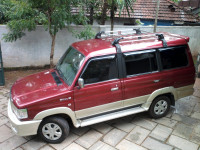 Metallic Maroon Toyota Qualis